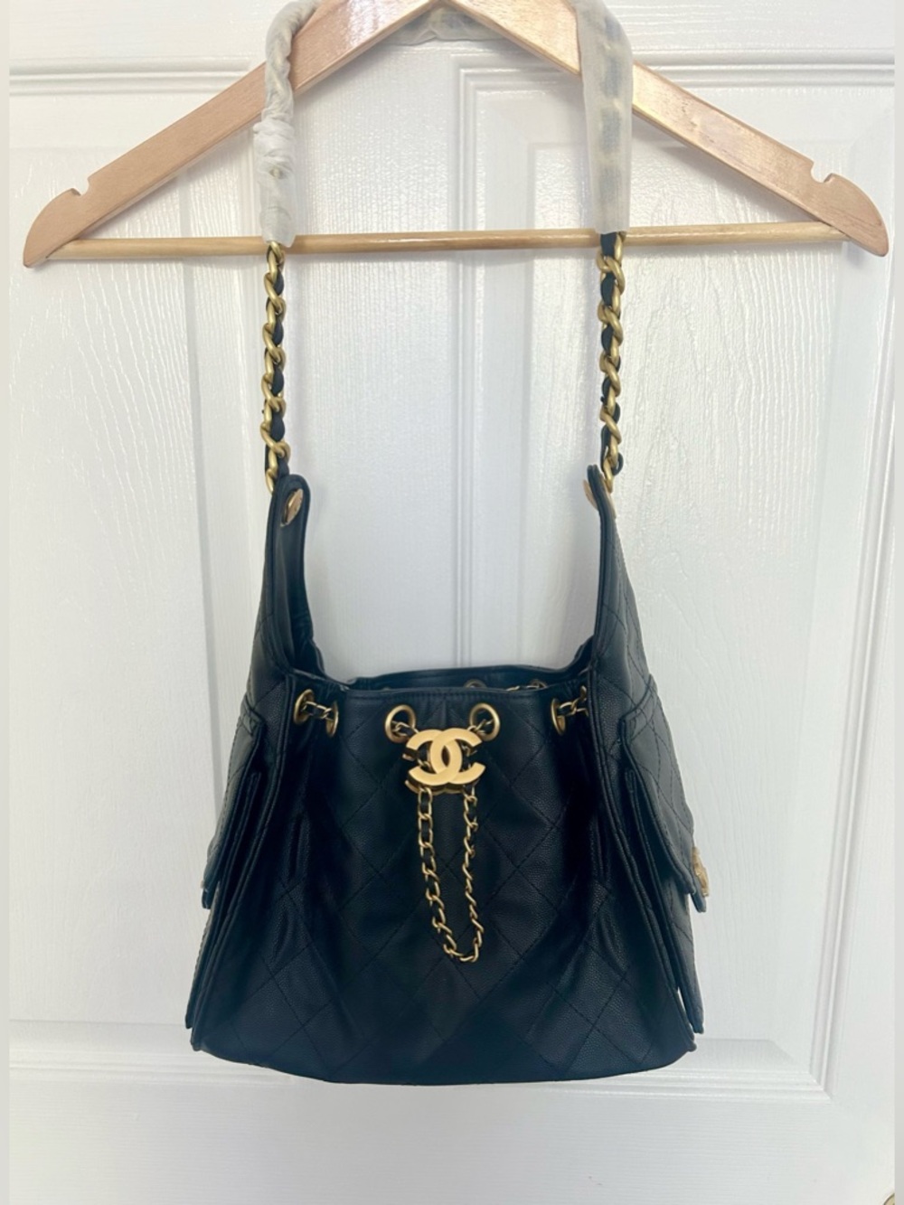 Black Quilted Leather Drawstring Shoulder Bag with Gold CC Accent